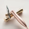 tom's studio butterfly brass pen rest